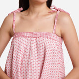 Front Detail of a Model wearing White Crinkled Cotton Strappy Top