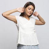 Front View of a Model wearing Off-White Crinkled Cotton Wrap Top