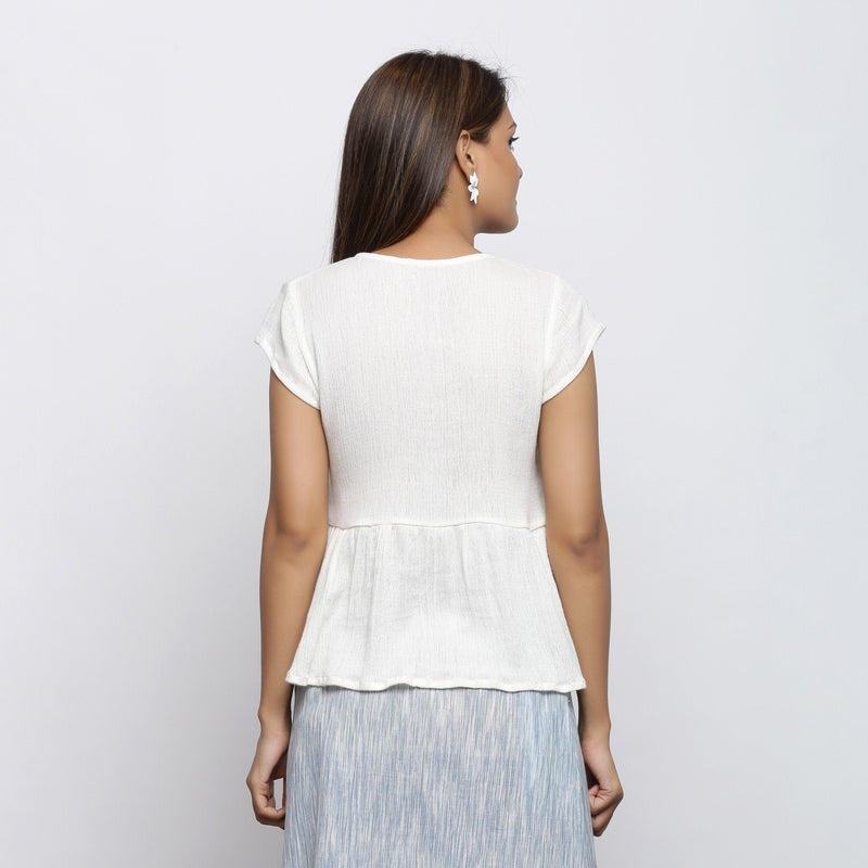 Back View of a Model wearing Off-White Crinkled Cotton Wrap Top