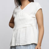 Front Detail of a Model wearing Off-White Crinkled Cotton Wrap Top