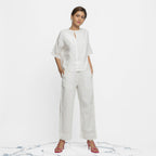 Front View of a Model wearing Off-White Hand Embroidered Top and Pant Set