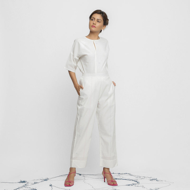 Front View of a Model wearing Off-White Hand Embroidered Top and Pant Set