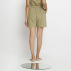 Front View of a Model wearing Khaki Vegetable Dyed Handspun Short Shorts