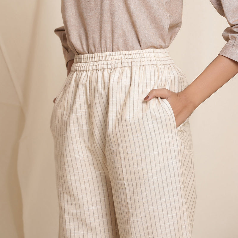 Front Detail of a Model wearing Dusk Beige Cotton Striped Elasticated Pant