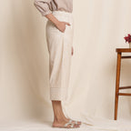 Right View of a Model wearing Dusk Beige Cotton Striped Elasticated Pant