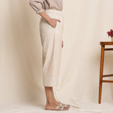 Right View of a Model wearing Dusk Beige Cotton Striped Elasticated Pant