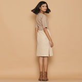 Back View of a Model wearing Dusk Beige Slim Fit Shift Dress