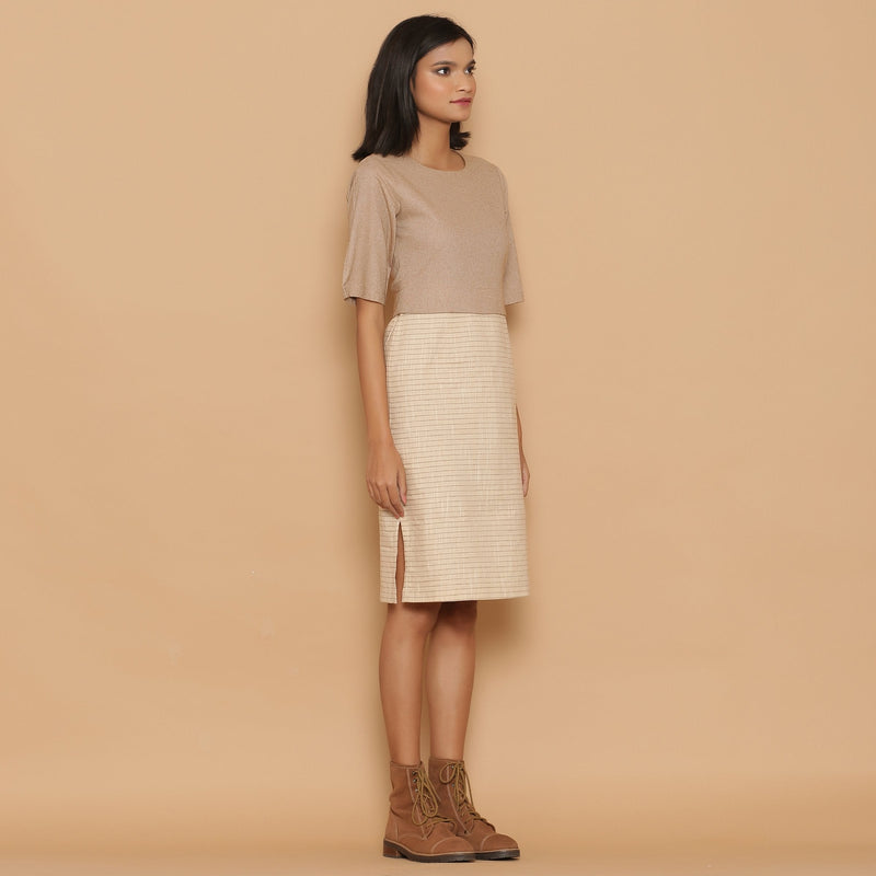 Right View of a Model wearing Dusk Beige Slim Fit Shift Dress