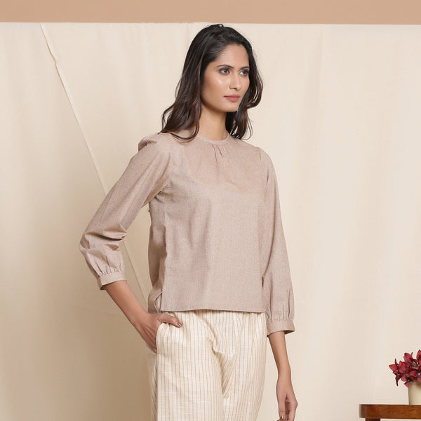 Right View of a Model wearing Dusk Brown Straight Gathered Top