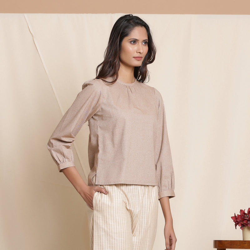 Right View of a Model wearing Dusk Brown Straight Gathered Top