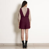Back View of a Model wearing Warm Berry Wine Frilled Waist Romper