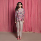 Front View of a Model wearing Dust Pink Chanderi Block Print Frilled Yoked Top