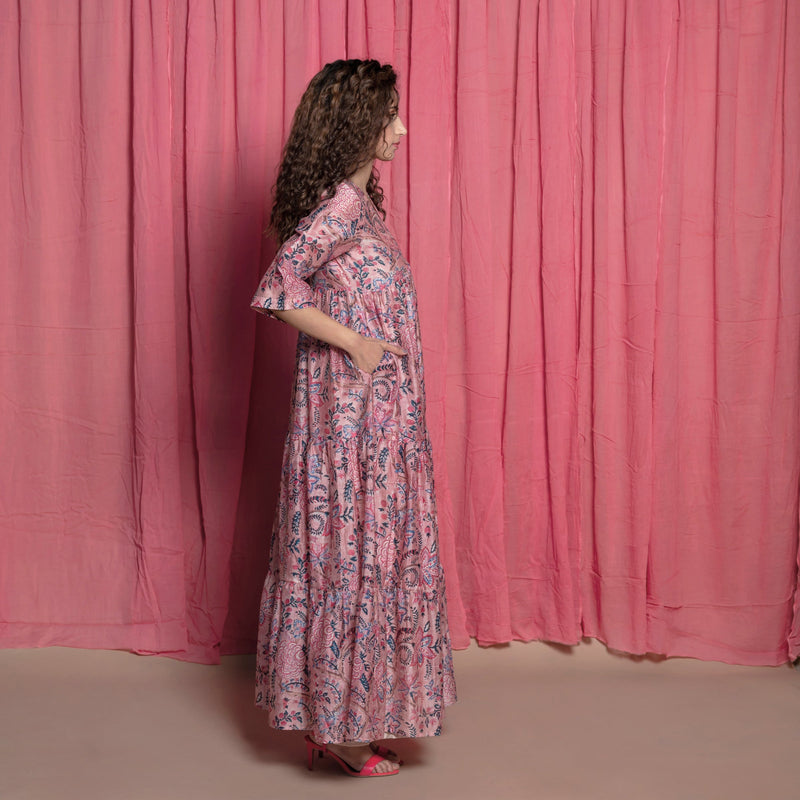 Right View of a Model wearing Dust Pink Floral Chanderi Block Print Tier Dress