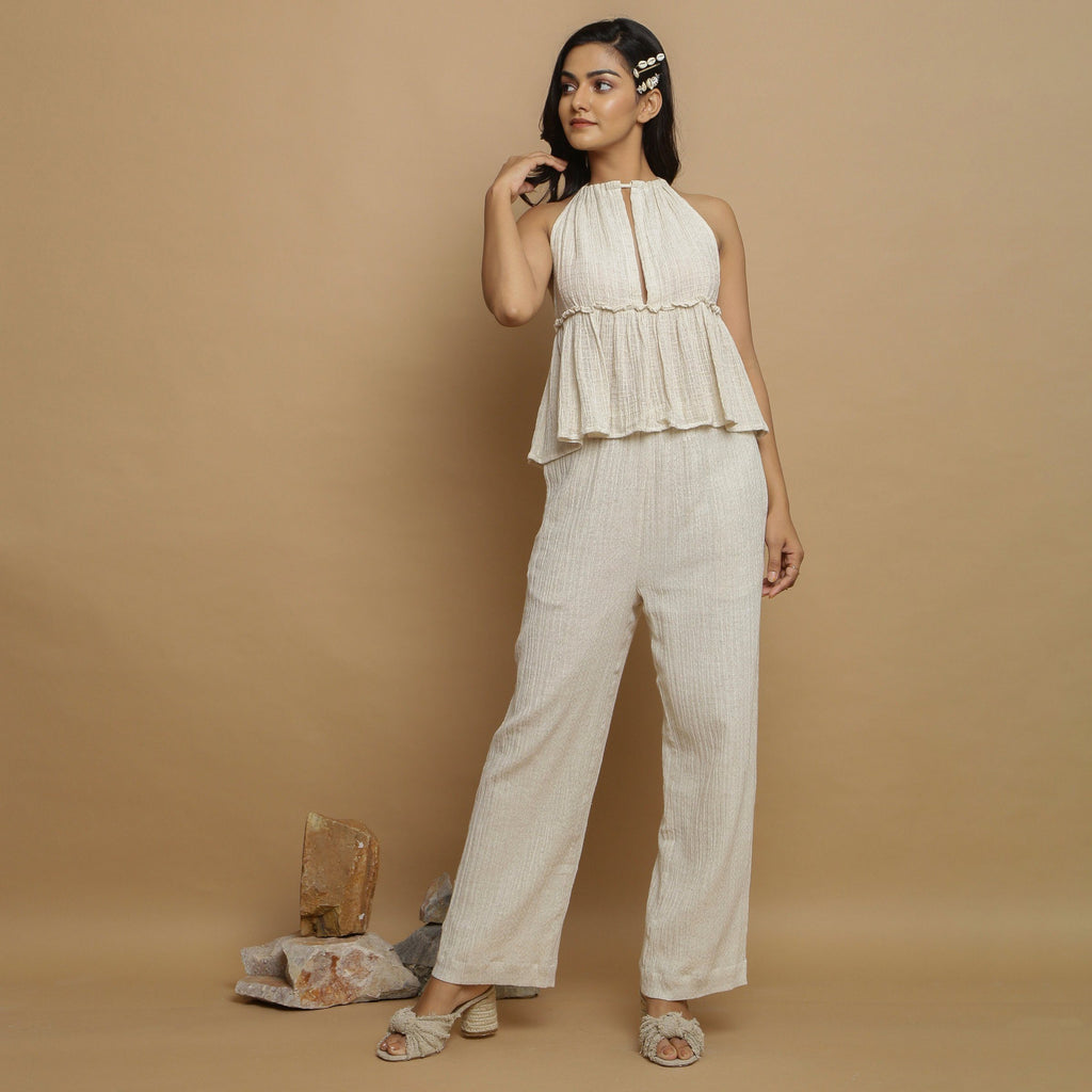 Front View of a Model wearing Ecru Cotton Flax Sleeveless Flared Top