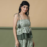 Front View of a Model wearing Fern Green Shibori Tier Camisole Top