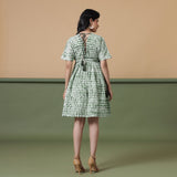 Back View of a Model wearing Fern Green Shibori Drop Shoulder Dress