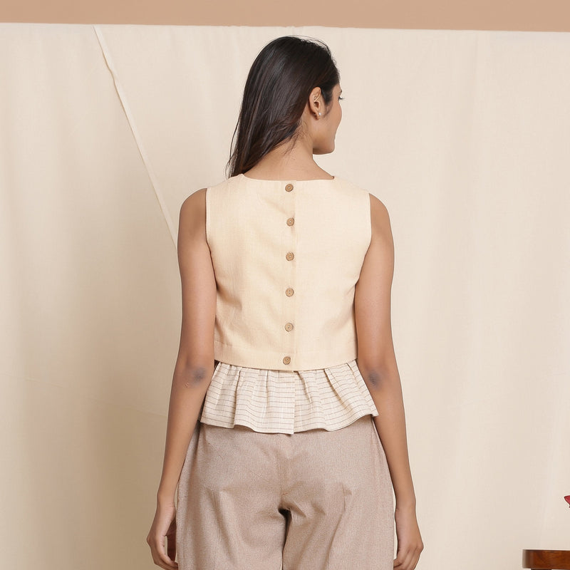 Back View of a Model wearing Beige Striped Surplice Blouson Top