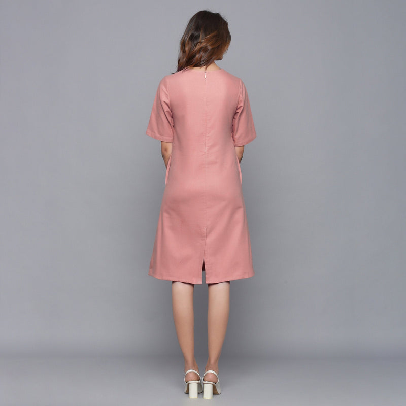 Back View of a Model wearing English Rose Round Neck Sheath Dress