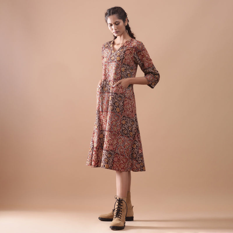 Left View of a Model wearing Flannel Kalamkari Muddy Red V-Neck Dress