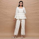 Front View of a Model wearing Chic Jute Laced Peplum Top and Pant Set