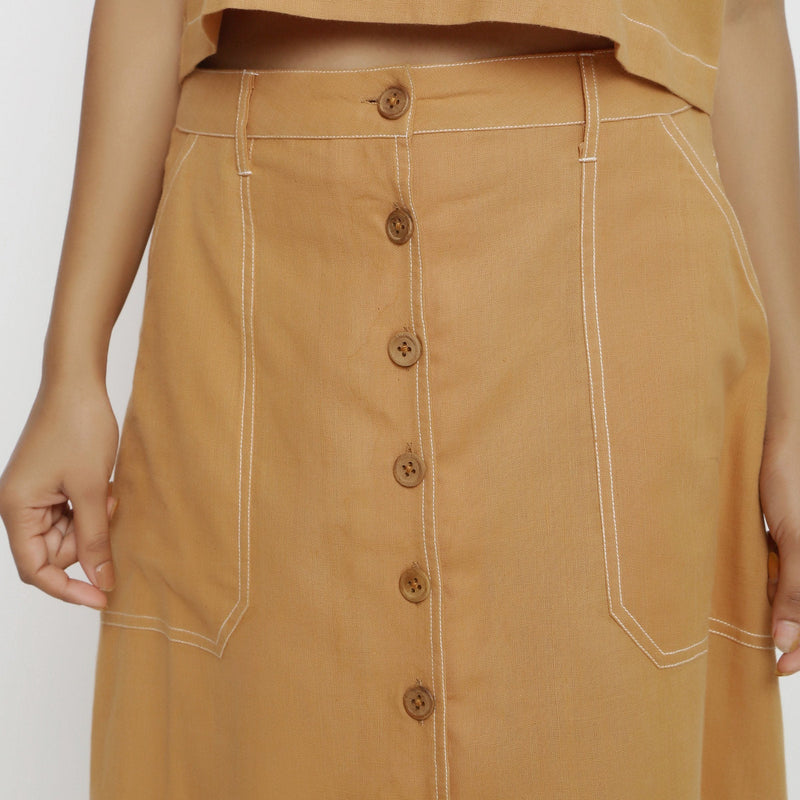 Front Detail of a Model Wearing Rustic Vegetable Dyed Button-Down Skirt
