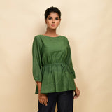 Front View of a Model wearing Forest Green 100% Cotton Round Neck Peplum Top