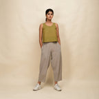 Front View of a Model wearing Gold Green 100% Cotton Sleeveless Short Top