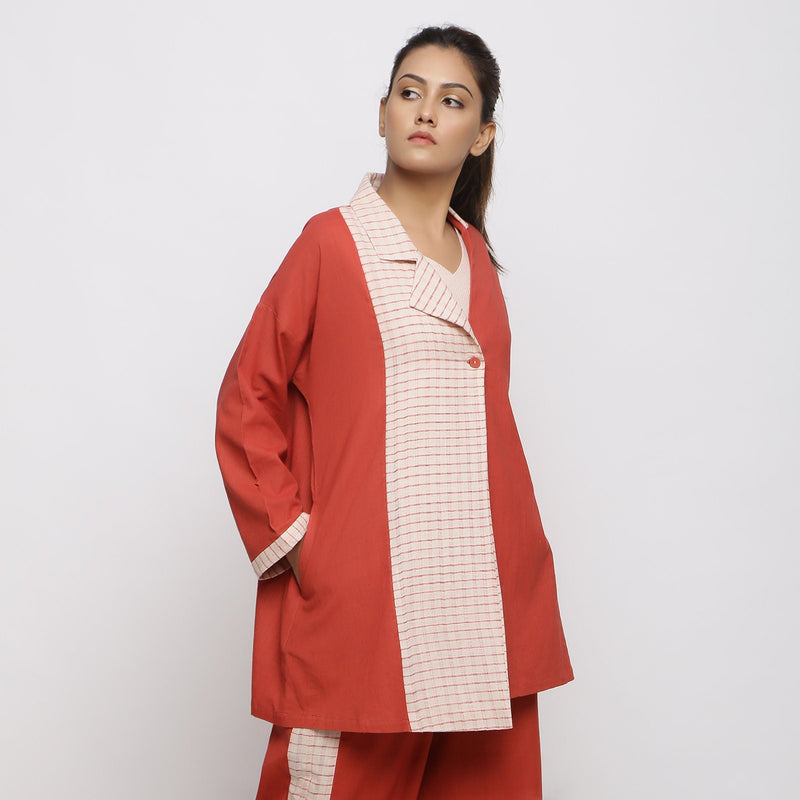 Right View of a Model wearing Vegetable Dyed Cotton Paneled Outerwear