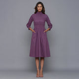 Front View of a Model wearing Grape Wine Flannel High Neck Midi Dress