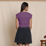 Back View of a Model wearing Grape Wine Top and Overlap Skirt Set