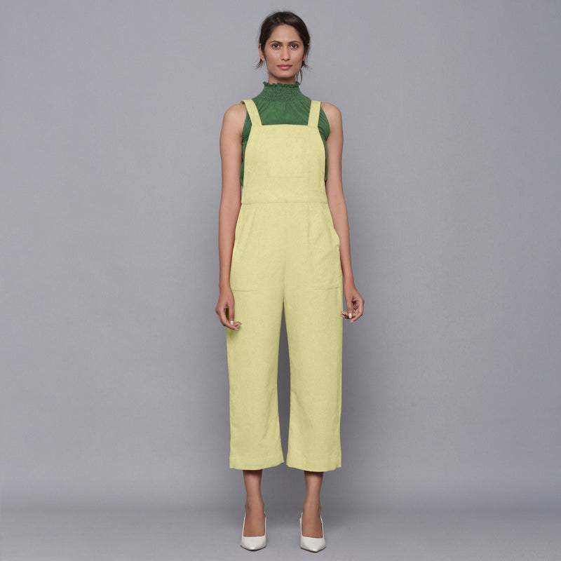 Front View of a Model wearing Green Corduroy Top and Yellow Dungaree Set