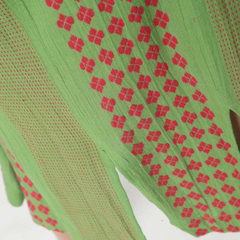 Close View of a Model wearing Green Crinkled Cotton Geometric A-Line Skirt
