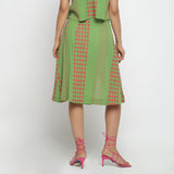 Back View of a Model wearing Green Crinkled Cotton Geometric A-Line Skirt