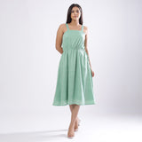 Front View of a Model wearing Green Handspun Strappy Circular Dress