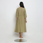 Back View of a Model wearing Green Raglan Sleeves Button-Down Dress