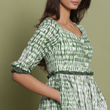 Front Detail of a Model wearing Green Shibori Asymmetrical Tier Maxi Dress