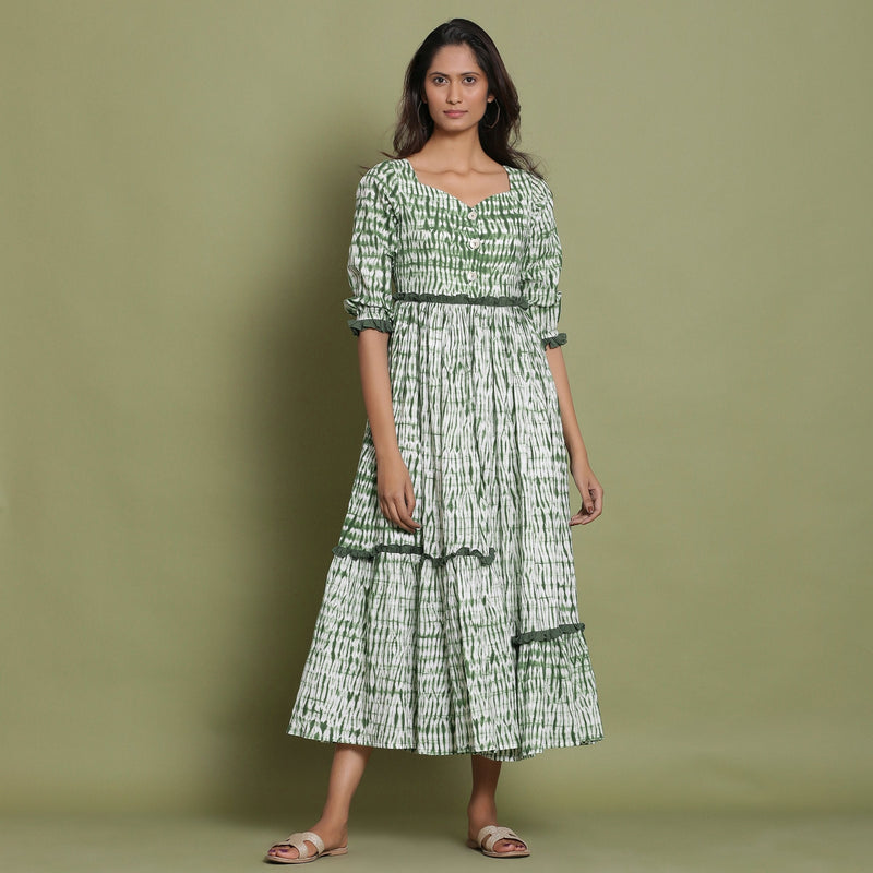 Front View of a Model wearing Green Shibori Asymmetrical Tier Maxi Dress