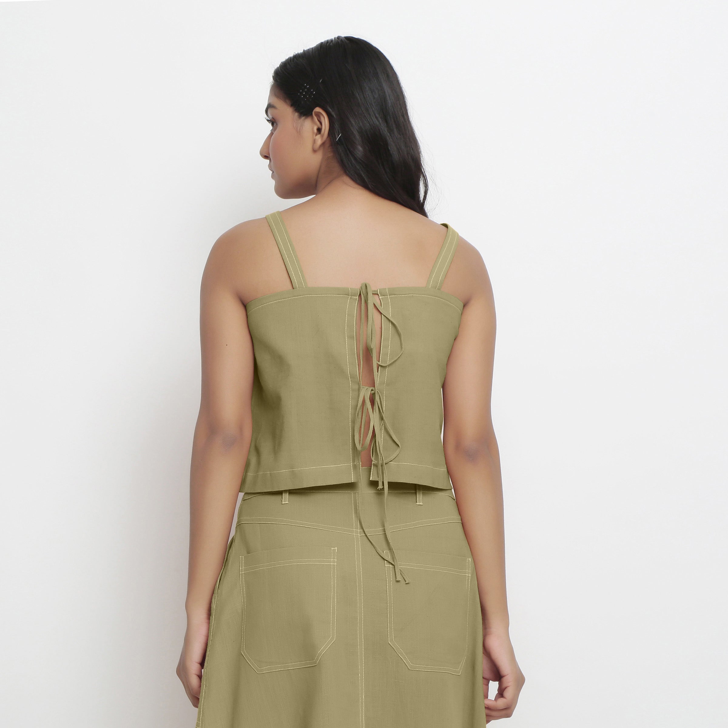 Back View of a Model wearing Vegetable-Dyed Green 100% Cotton Spaghetti Top