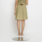Back View of a Model wearing Vegetable-Dyed Green 100% Cotton Mid-Rise Skirt