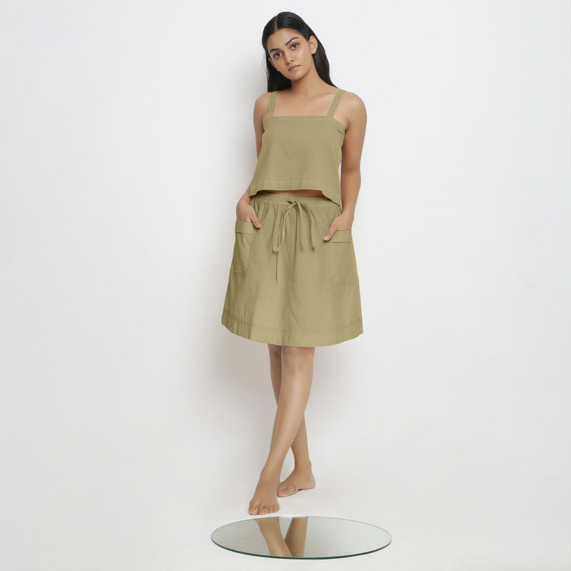 Front View of a Model wearing Green Spaghetti Top and Mid-Rise Skirt Set