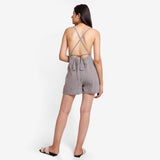 Back View of a Model wearing Grey Criss-Cross Back Paneled Romper