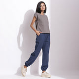 Right View of a Model wearing Comfy Navy Blue Cotton Waffle Jogger Pant