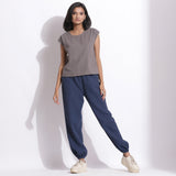 Front View of a Model wearing Grey Essential Top and Navy Blue Pant Set