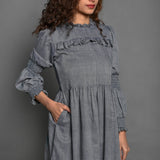 Front Detail of a Model wearing Grey Handspun Cotton Frilled Peasant Dress