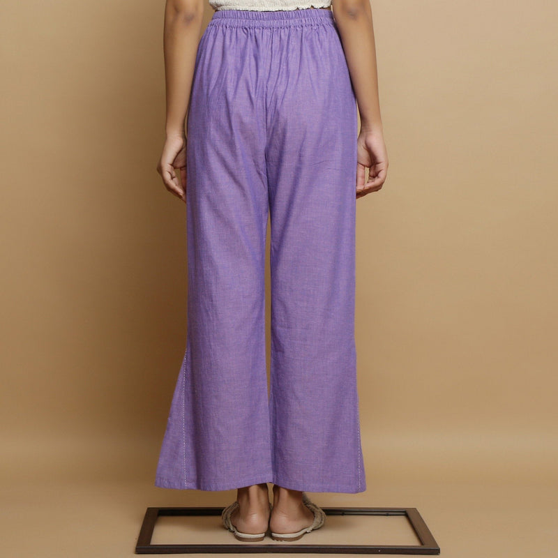 Back View of a Model wearing Lavender Ankle Length Godet Pant