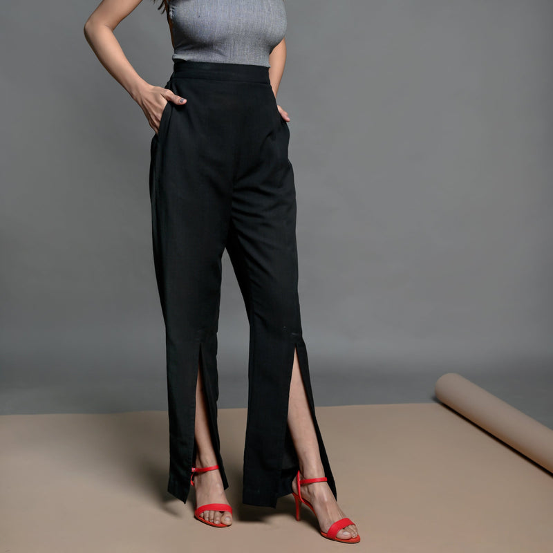 Right View of a Model wearing Black Handspun Cotton High Rise Slit Pants