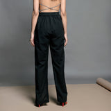 Back View of a Model wearing Black Handspun Cotton High Rise Slit Pants