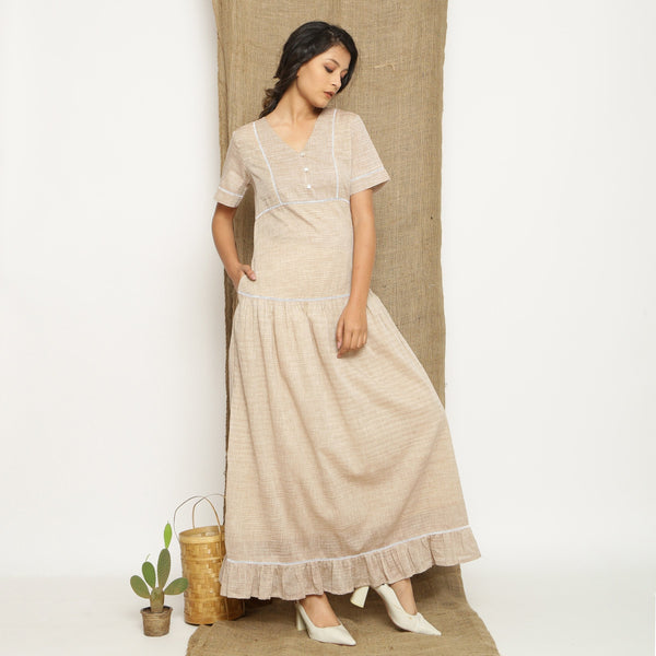 Front View of a Model wearing Handspun Cotton Lace Yoked Dress