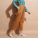 Right View of a Model wearing Handspun Cotton Muslin Mid Rise Pant