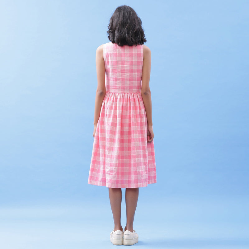 Back View of a Model wearing Handspun Cotton Pink Checks Yoke Dress